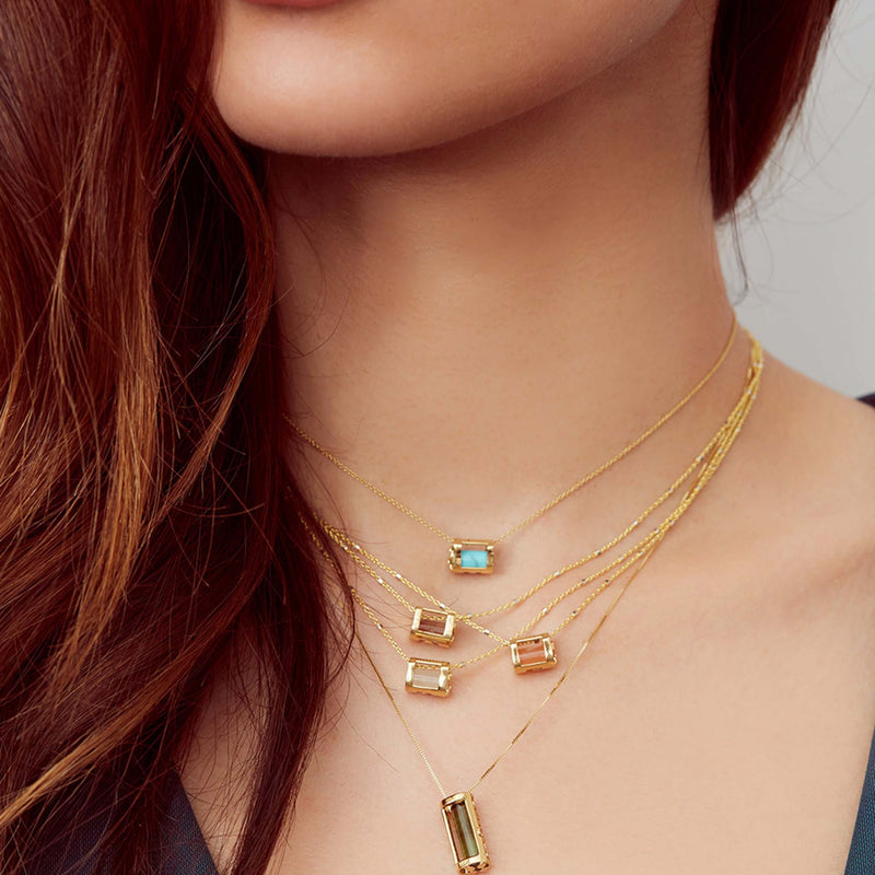 Solid 18k reclaimed gold Signature Initials pendant necklaces layered on model - Conges Life